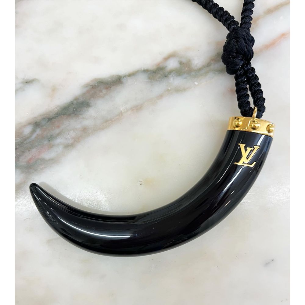 Louis Vuitton black horn pendant on cord