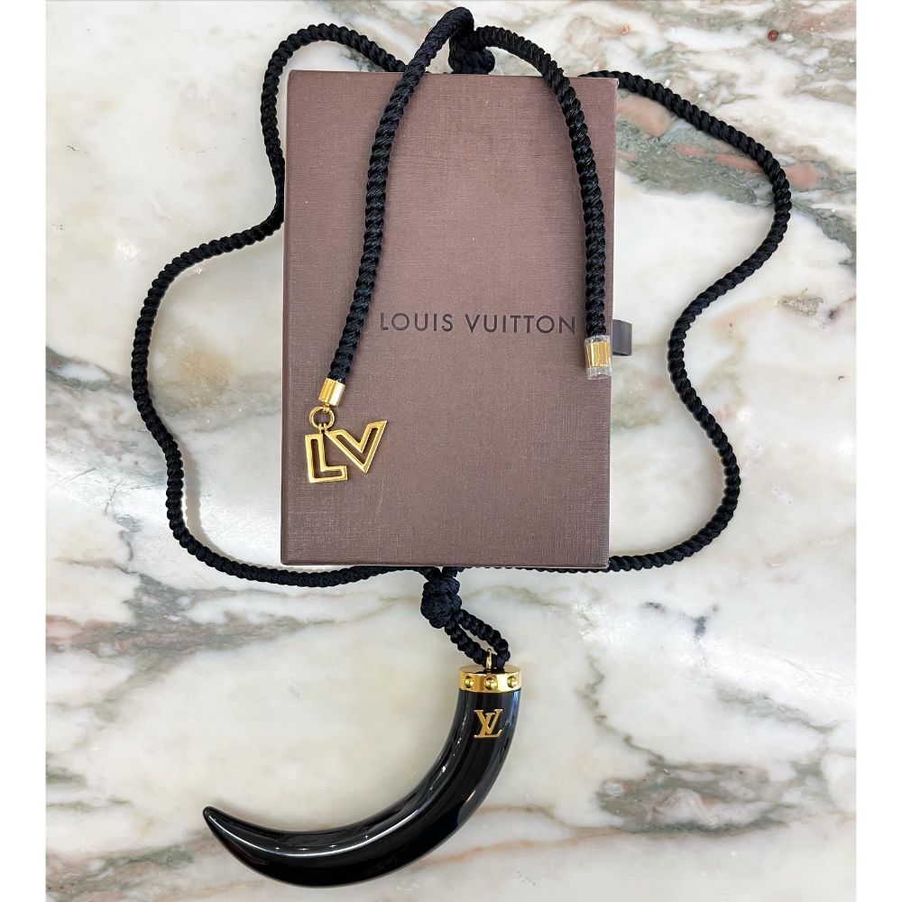 Louis Vuitton black horn pendant on cord