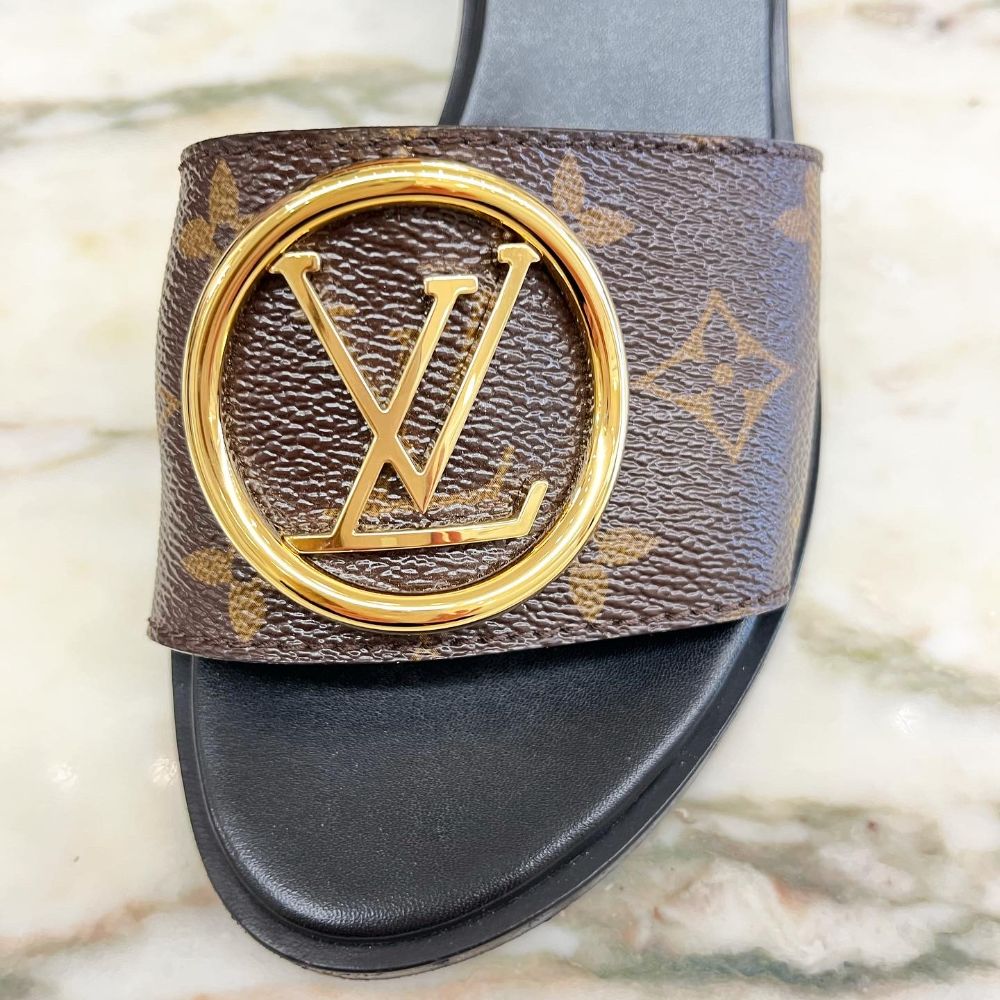 Louis Vuitton Lock-it leather mules