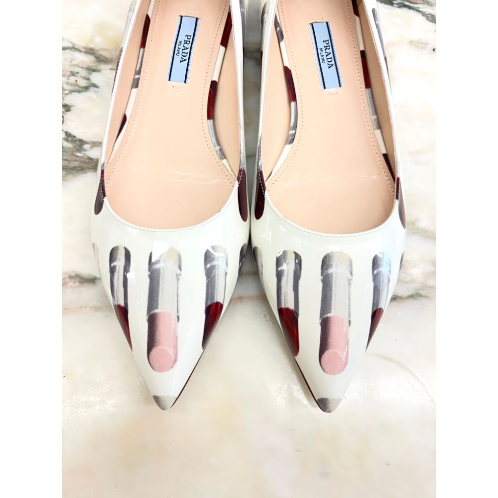Prada lipstick flats