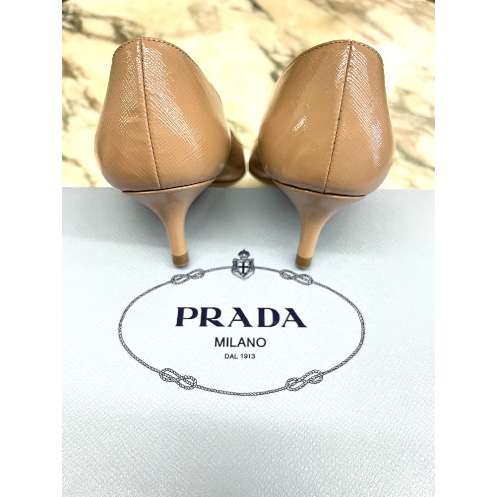 Prada beige patent leather pumps