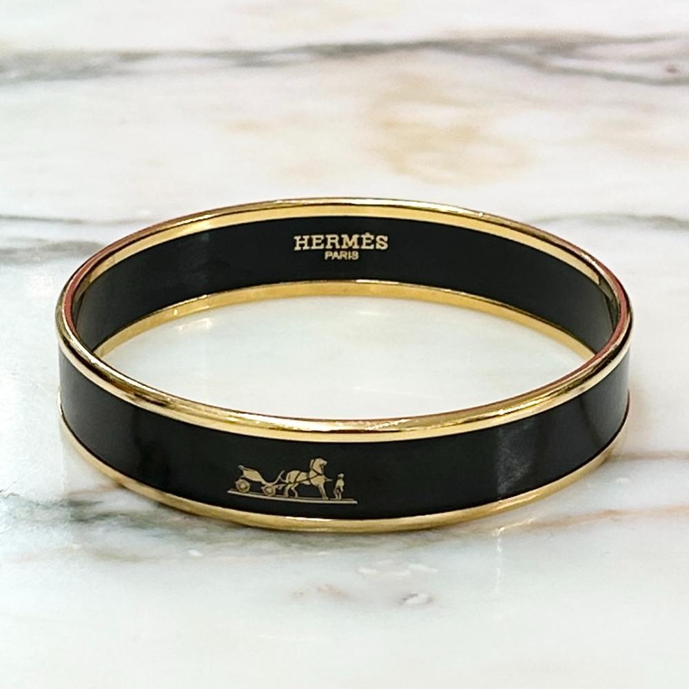 Hermès Caleche enamel bangle with gold trim
