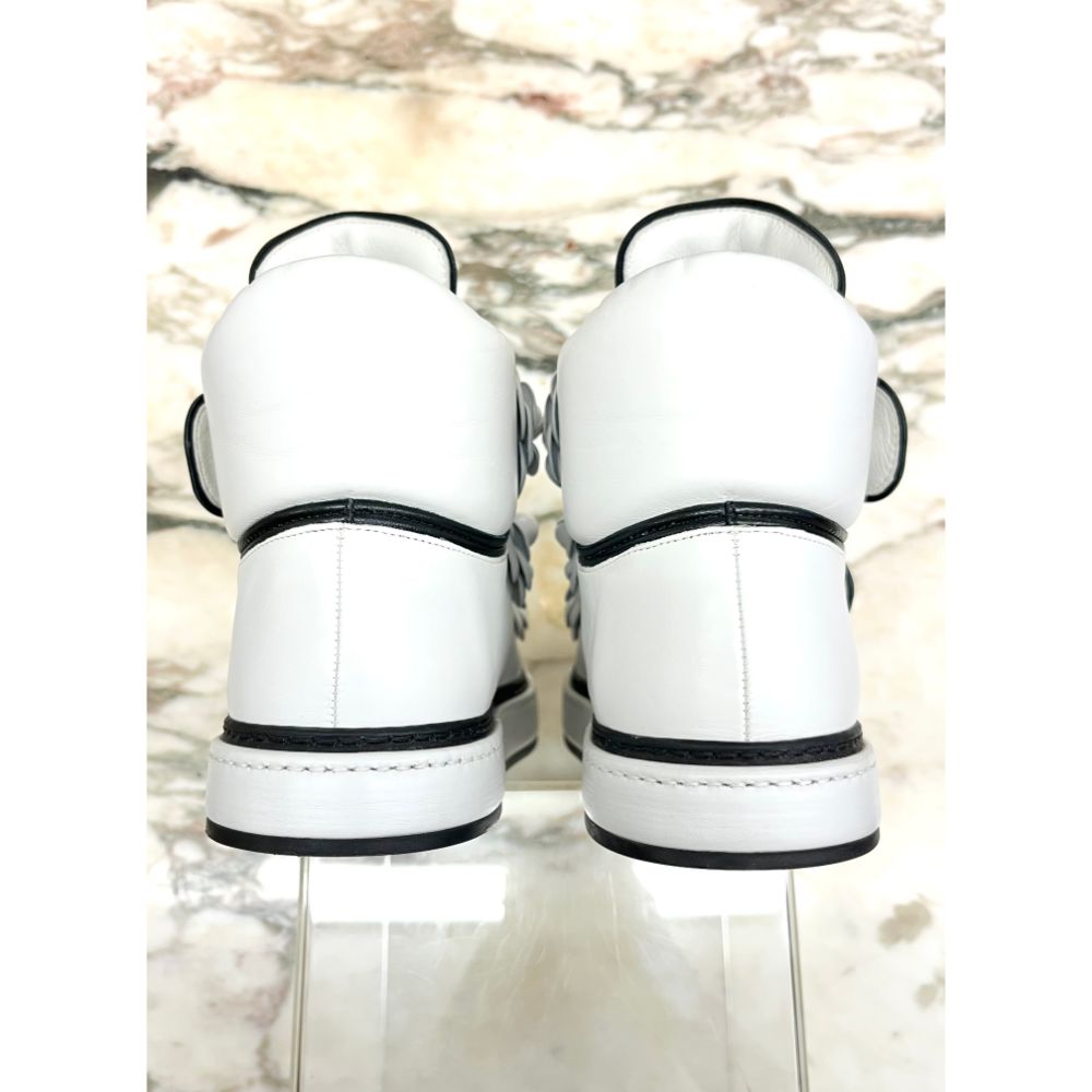 Chanel white leather camellia sneakers