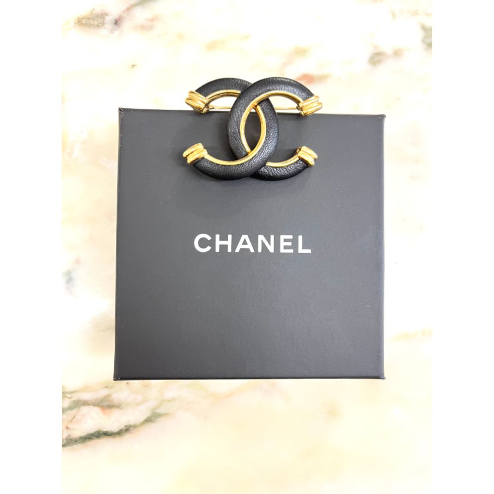 Chanel 2022 black leather CC brooch