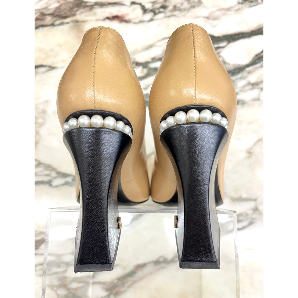 Chanel beige and black pearl shoes