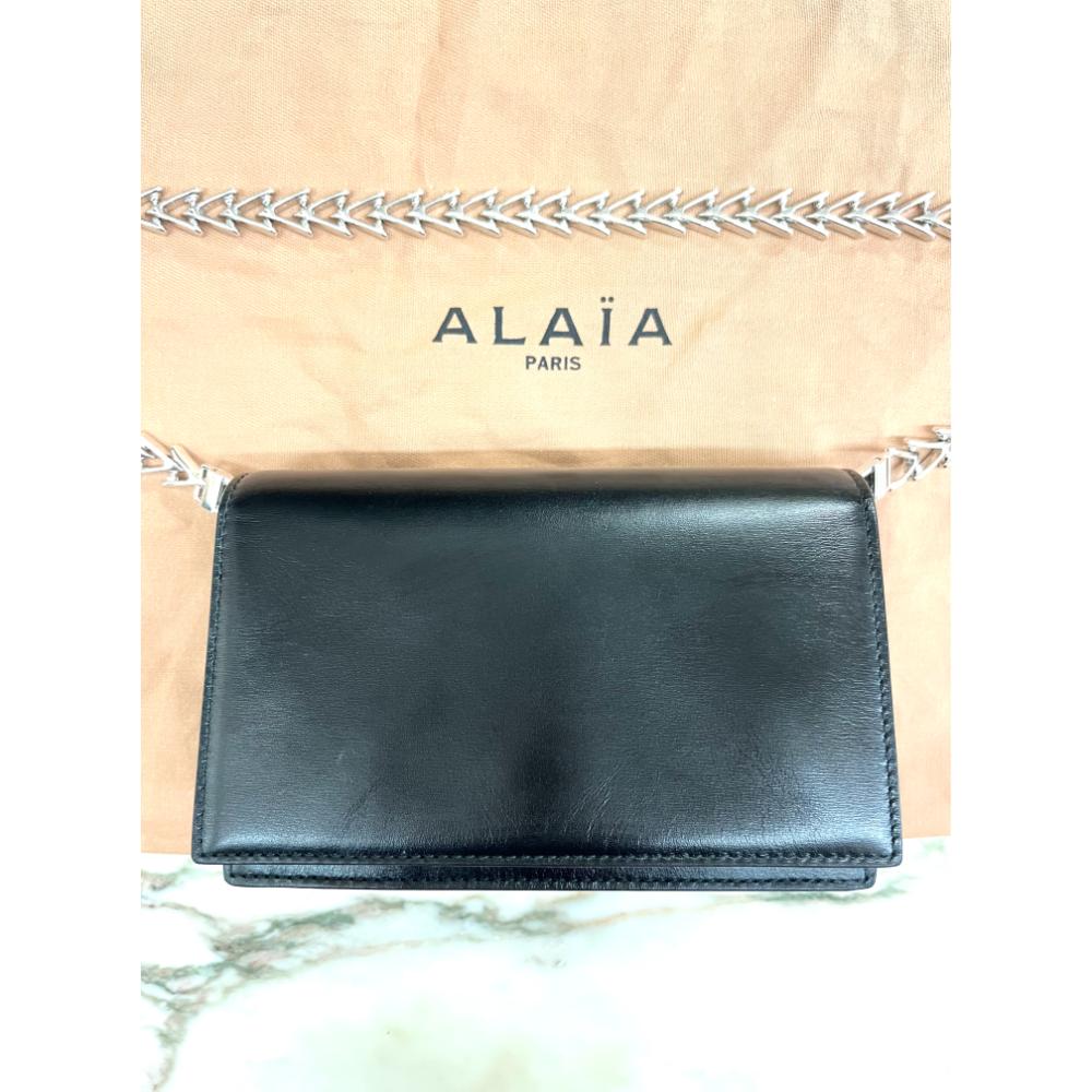 Alaia black leather crossbody bag