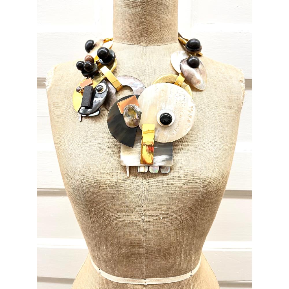 YSL runway shell necklace with faces