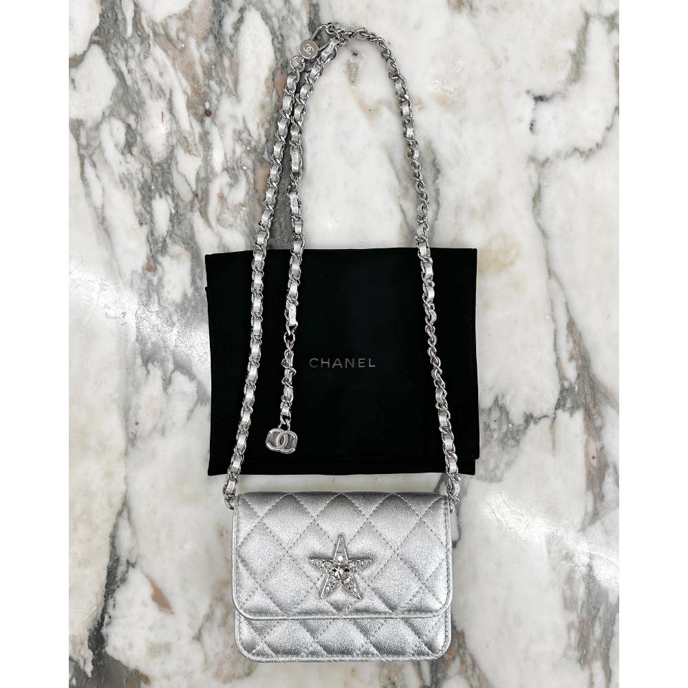 Chanel silver leather belt bag w/ crystal star