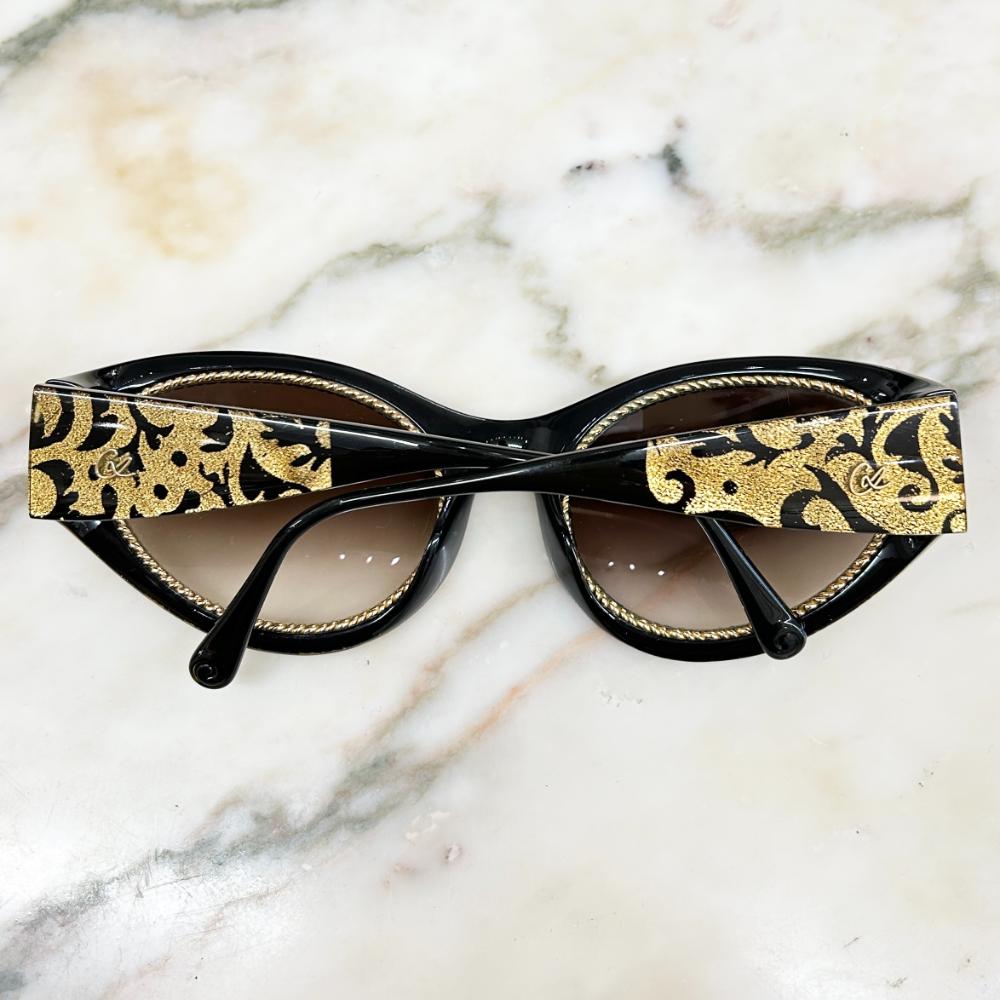 Christian Lacroix black & gold cat eye sunglasses