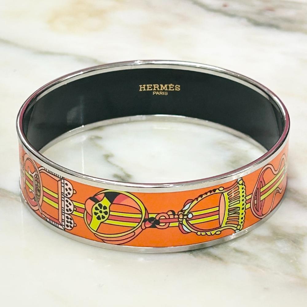 Hermès orange enamel Concours d'Etriers wide bangle bracelet