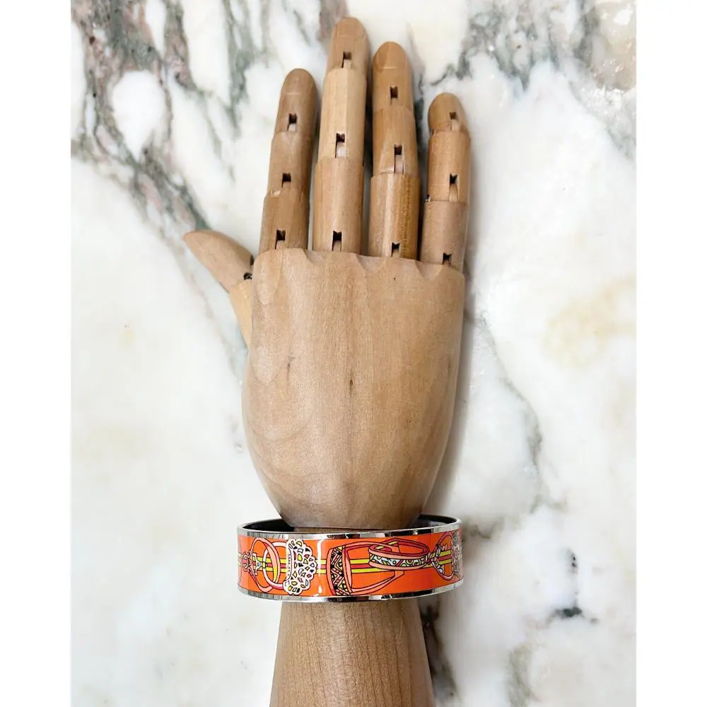 Hermès orange enamel Concours d'Etriers wide bangle bracelet