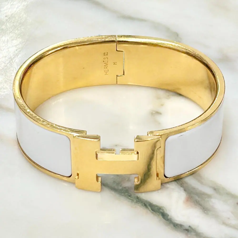 Hermès Clic Clac H bracelet in white enamel and gold plated metal