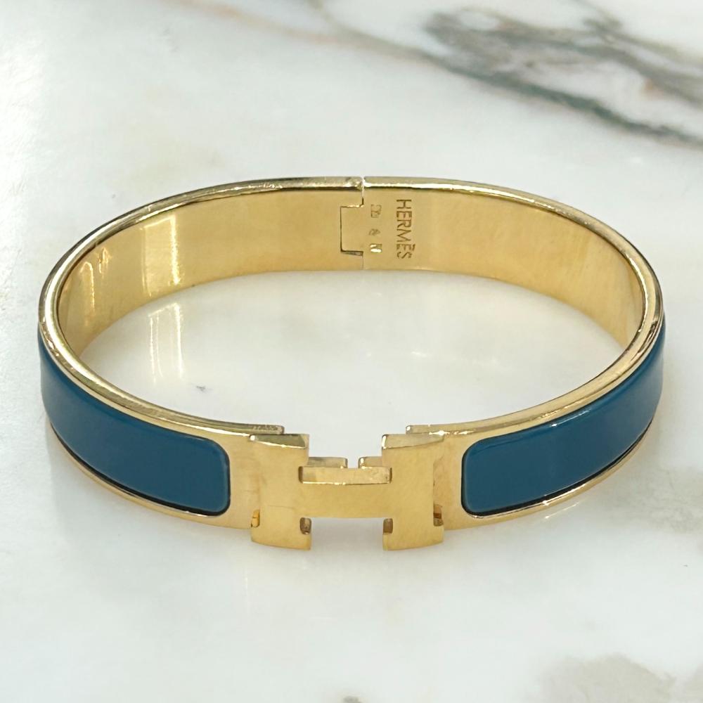 Hermès Clic H bracelet in teal enamel & gold plated metal