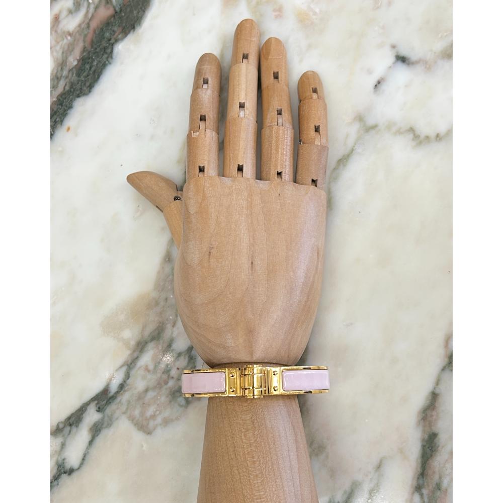 Hermès Enamel hinged bracelet in light pink and gold plated metal