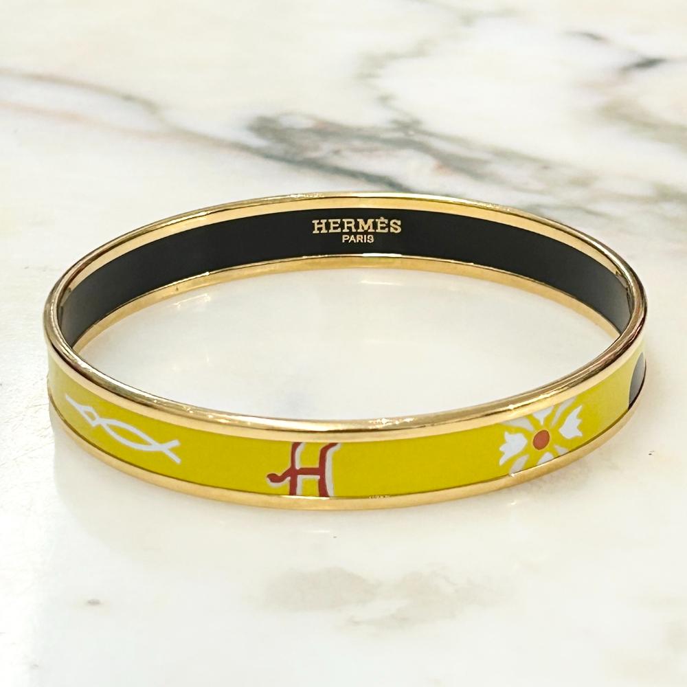 Hermès enamel abstract print bangle with gold plated trim