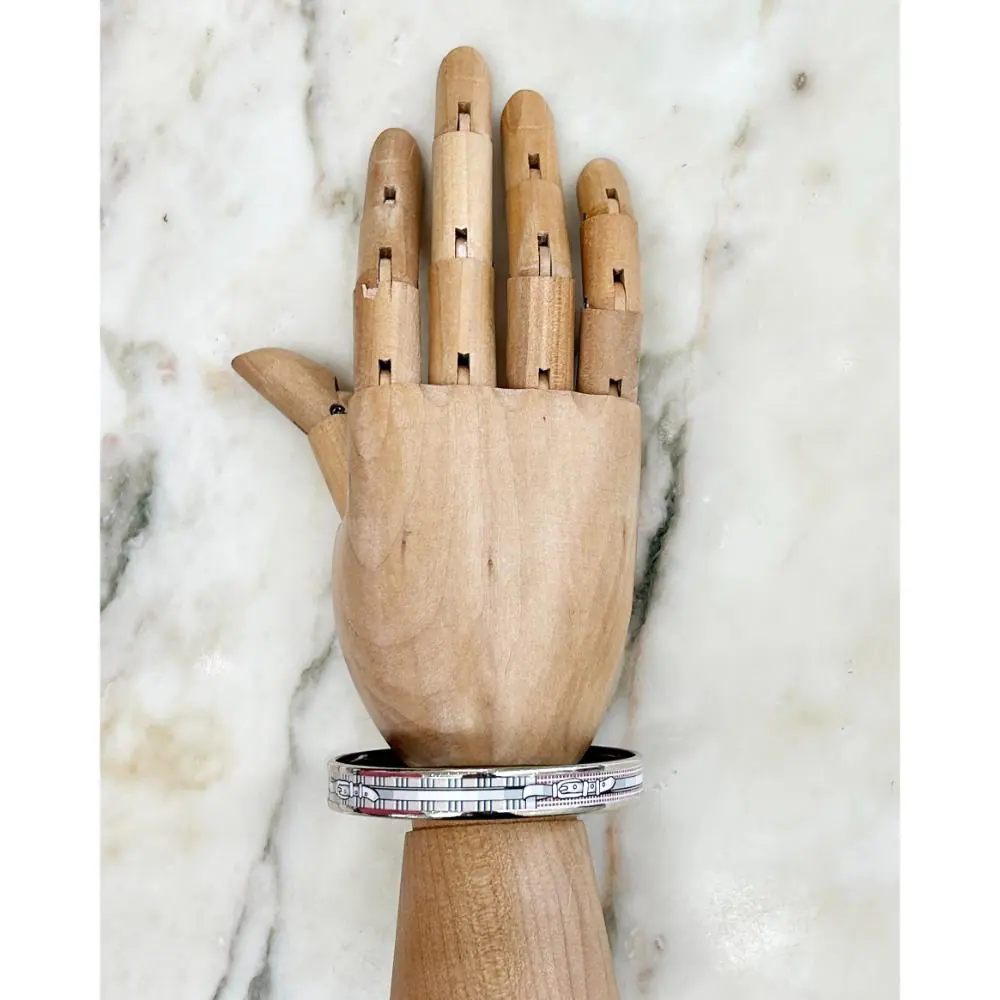 Hermès enamel belt print bangle with palladium trim