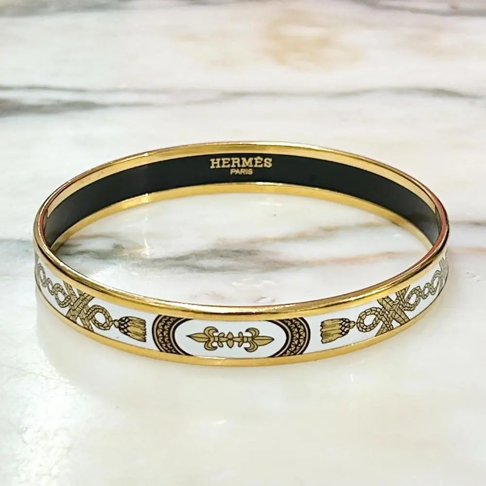 Hermès enamel Grand Apparat bangle with gold trim