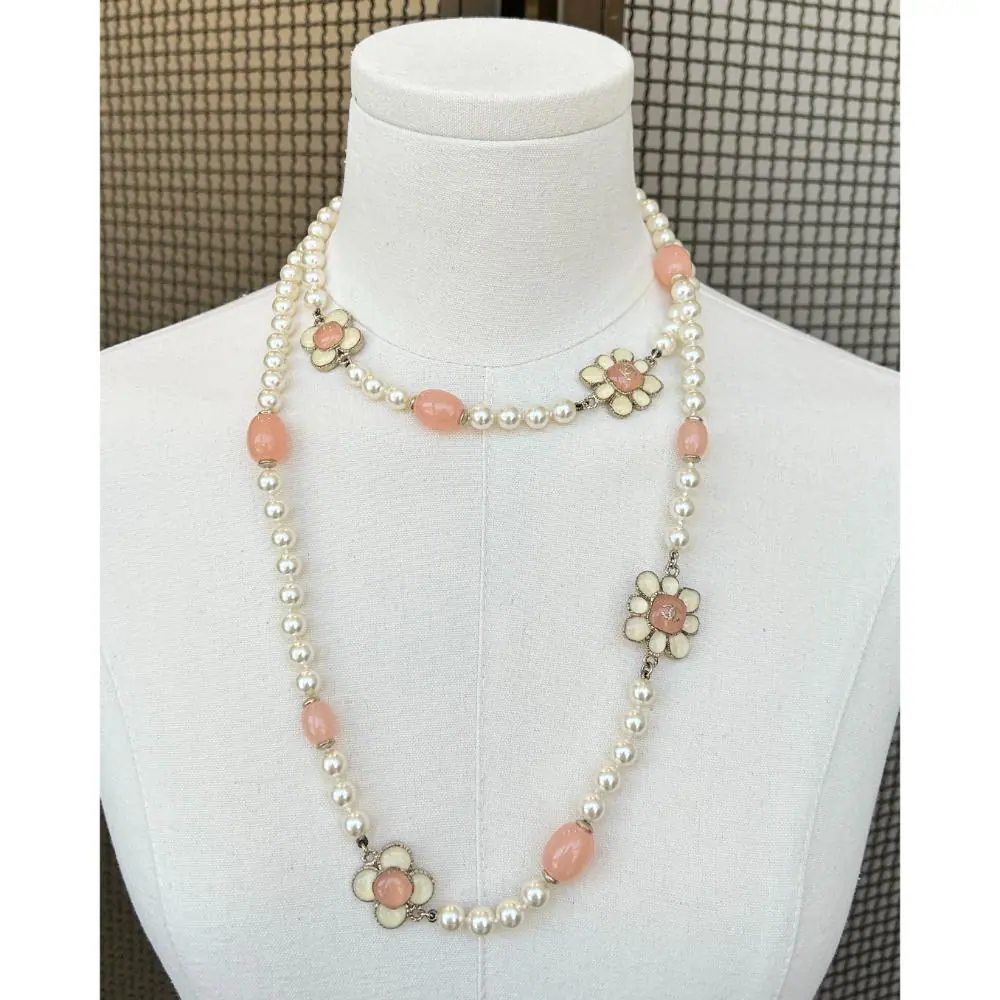 Chanel 2016 long pearl necklace with peach flower charms