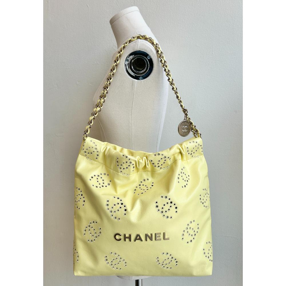 Chanel 2025 small 22 bag in yellow logo embroidered calfskin