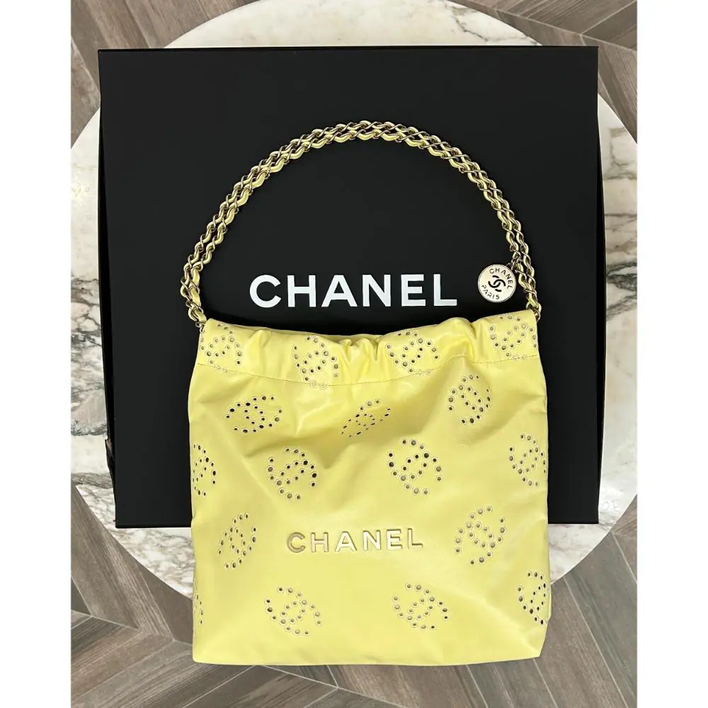 Chanel 2025 small 22 bag in yellow logo embroidered calfskin