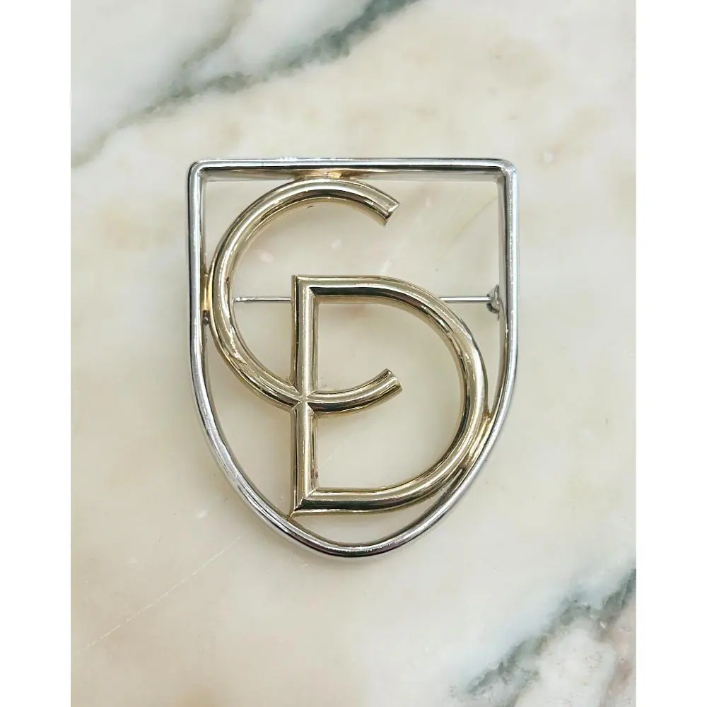 Dior vintage gold & silver logo brooch