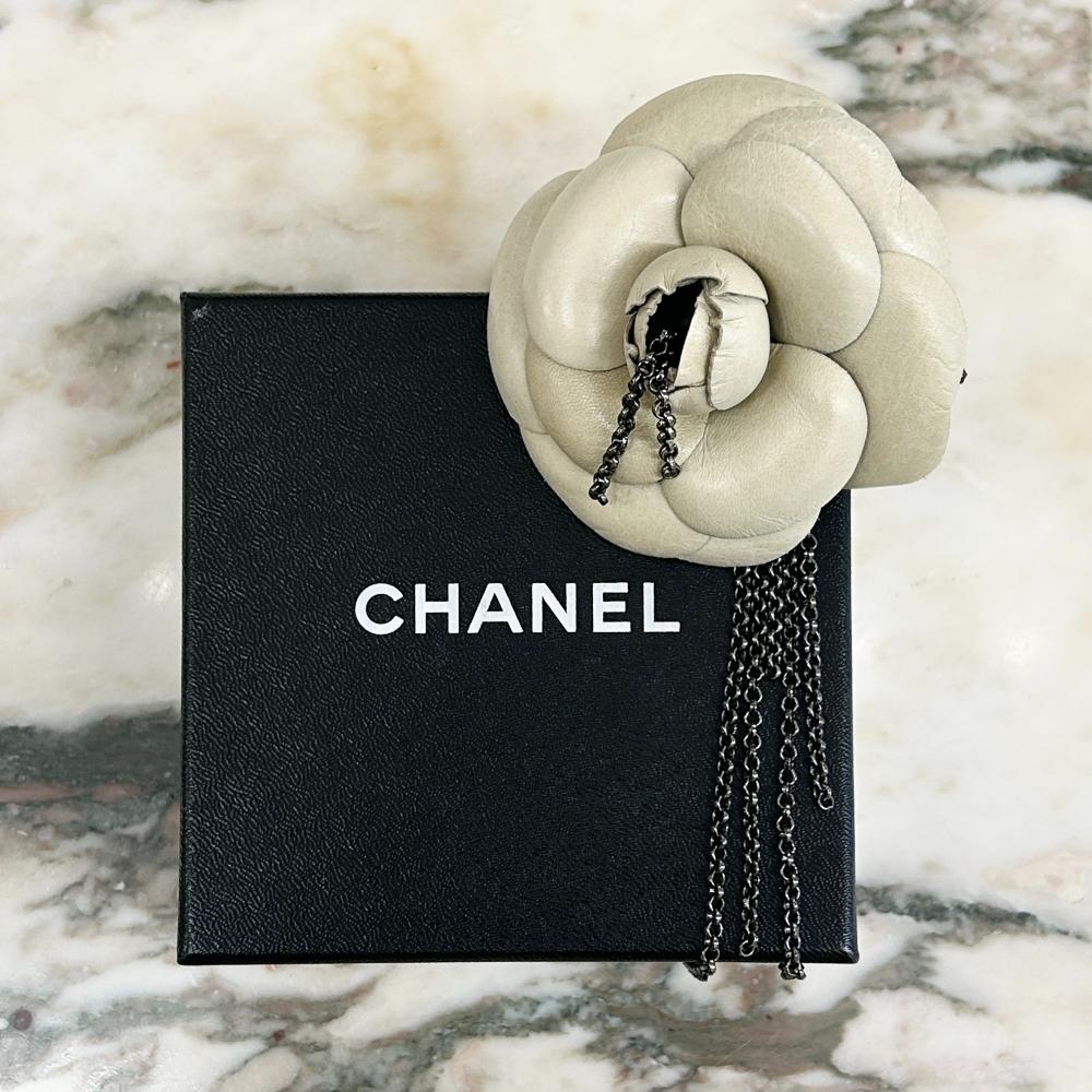 Chanel 2002 ecru leather camellia brooch w/ gunmetal silver chains