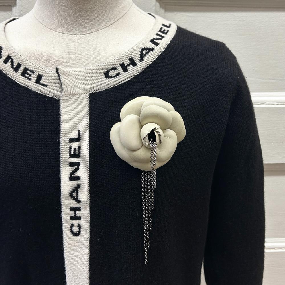 Chanel 2002 ecru leather camellia brooch w/ gunmetal silver chains