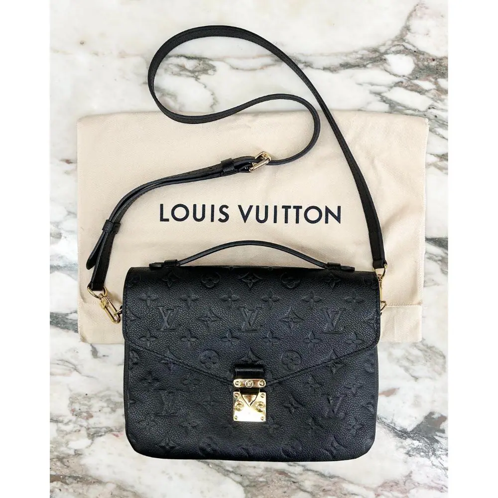 Louis Vuitton 2019 Pochette Métis bag in black Monogram Empreinte leather