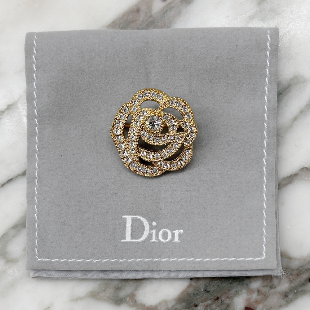 Dior gold tone & crystal flower brooch
