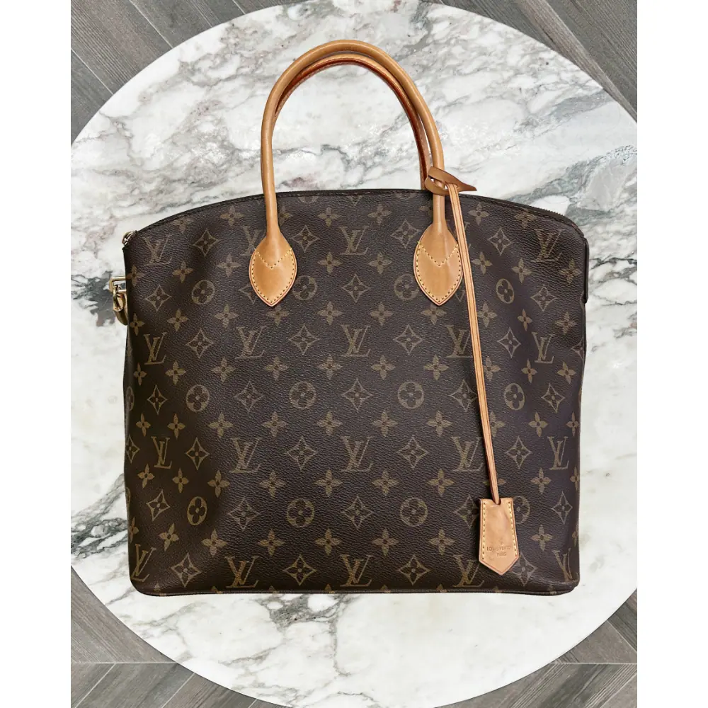 Louis Vuitton 2012 Monogram Canvas Lockit MM top handle bag