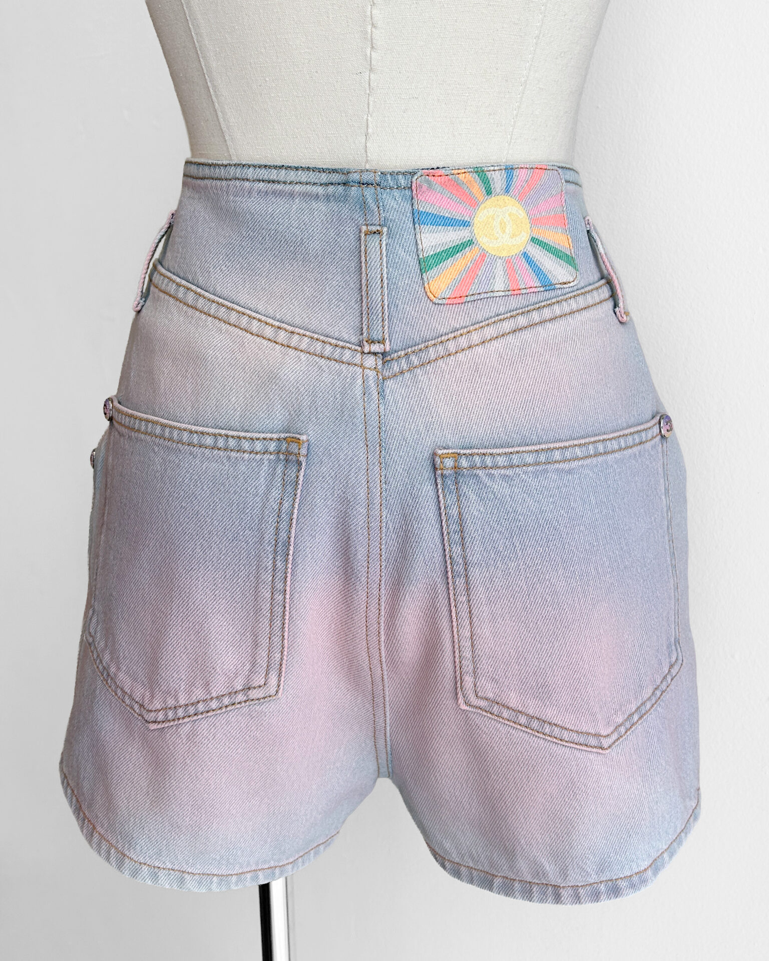 Chanel light wash and pink denim shorts
