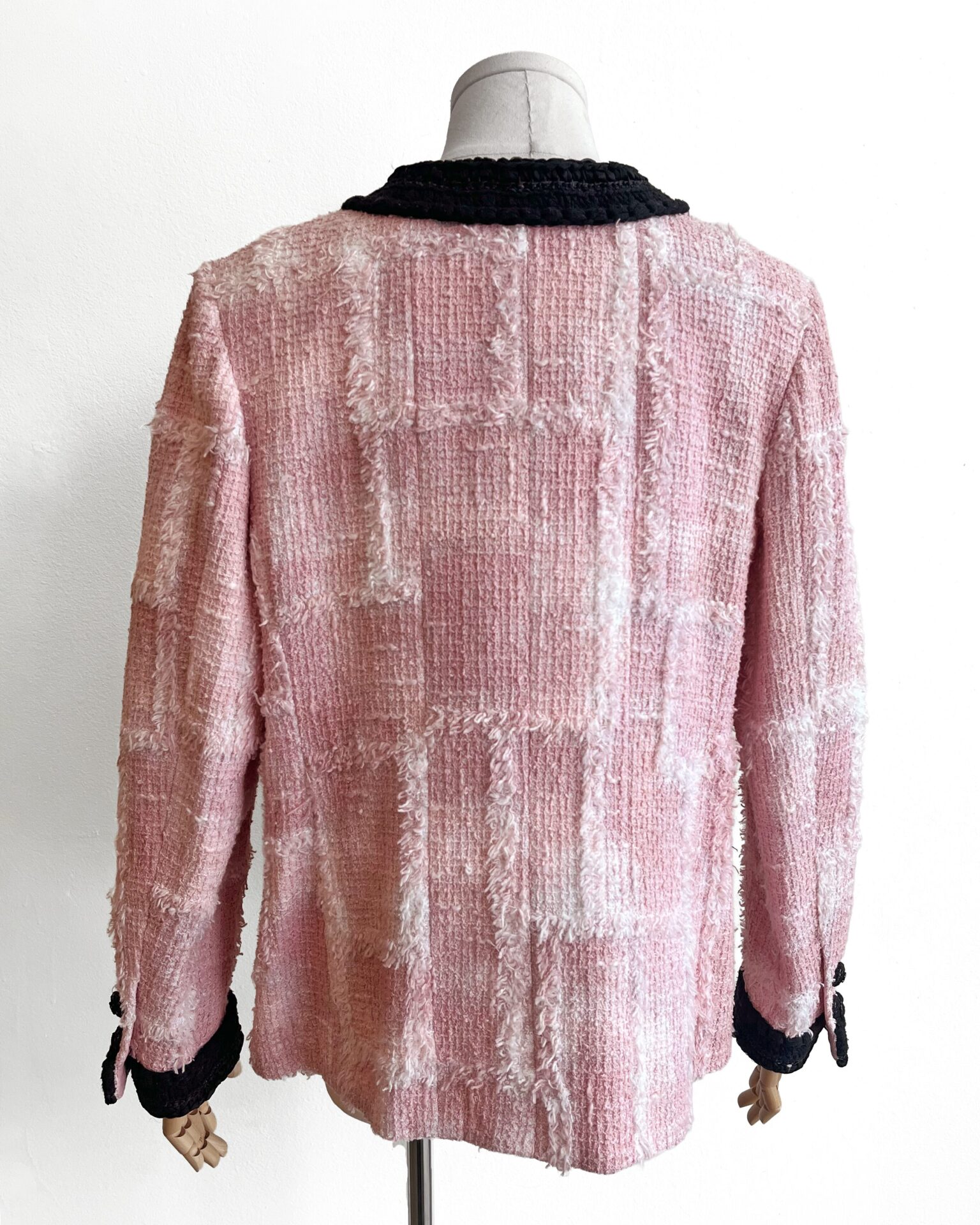 Chanel pink tweed jacket with black braided trim