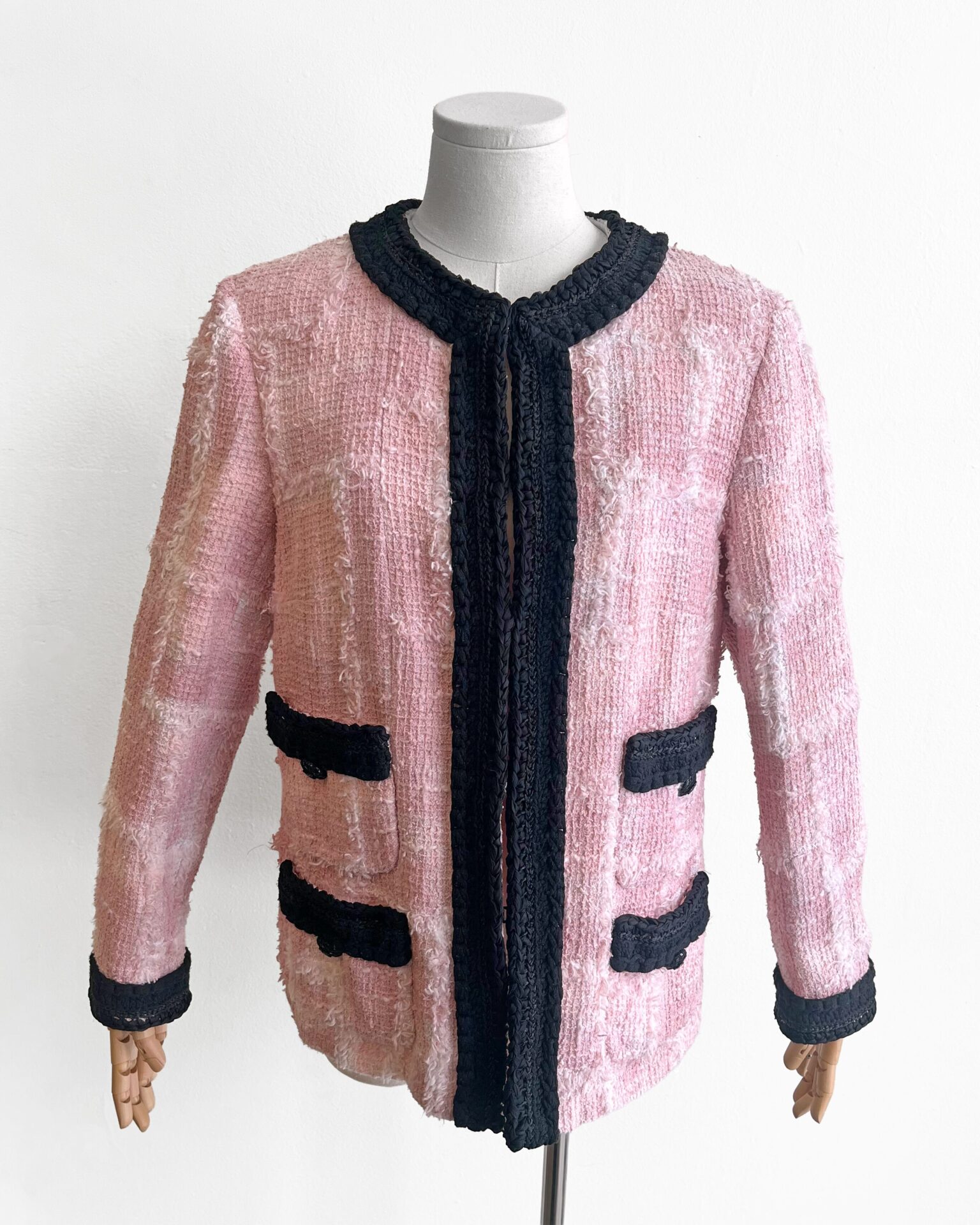 Chanel pink tweed jacket with black braided trim