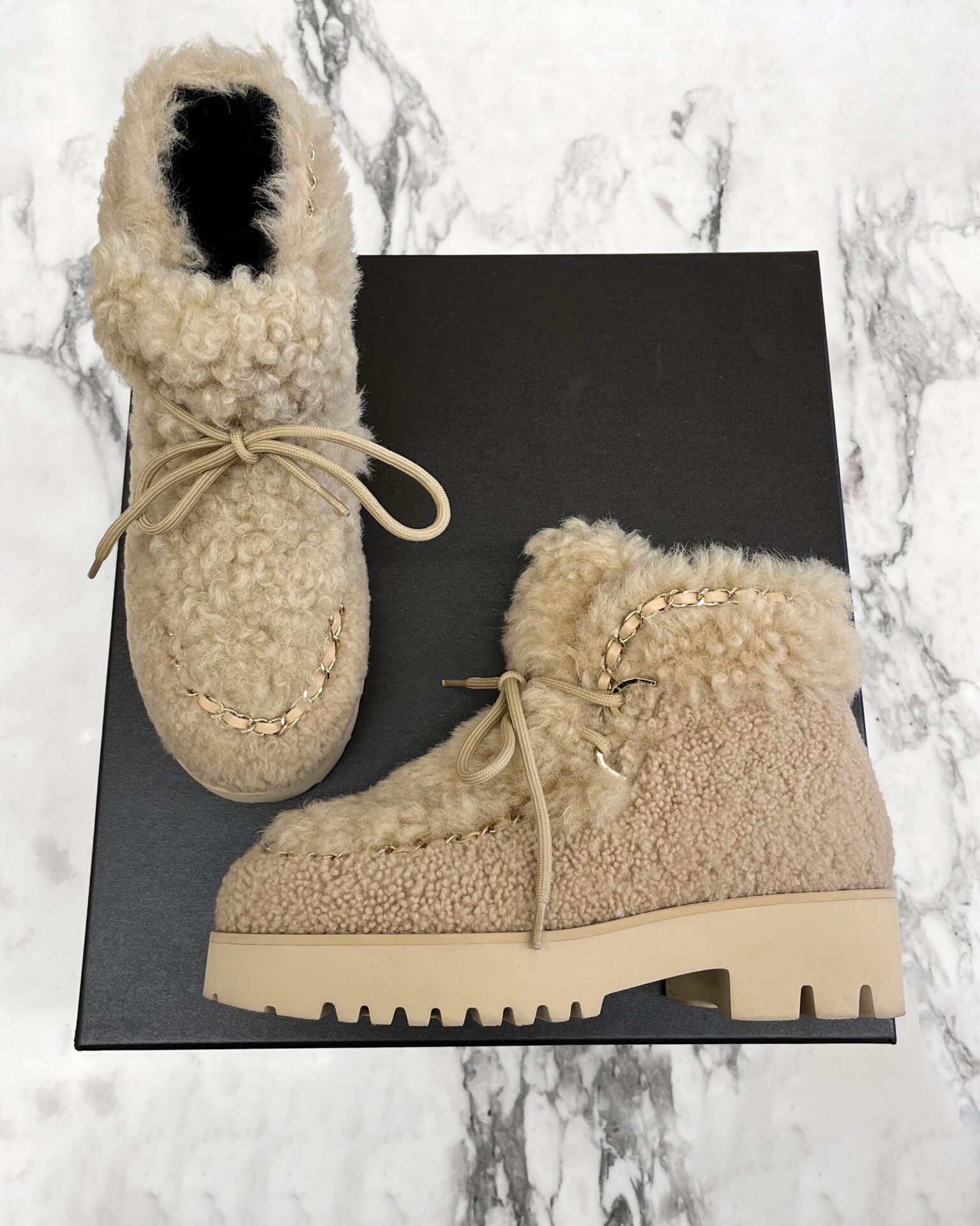 Chanel 2022 camel shearling boots with chain trim