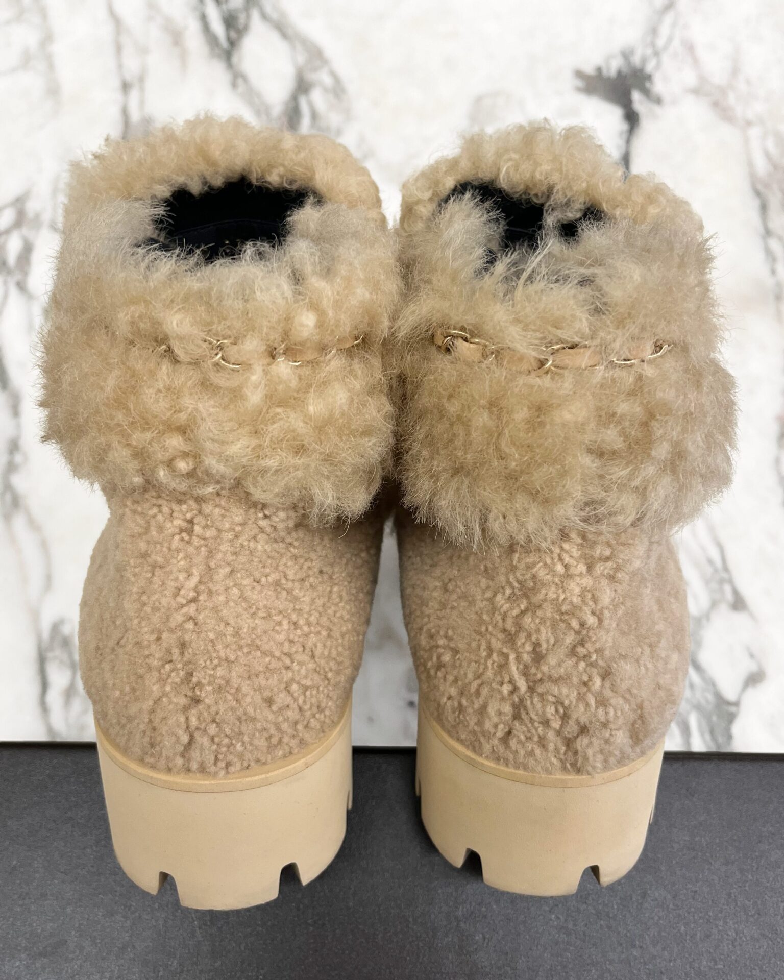 Chanel 2022 camel shearling boots with chain trim