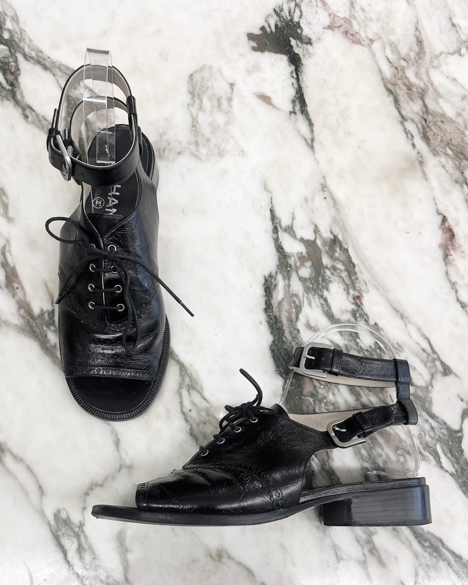 Chanel brogue lace-up sandals in black crinkle leather