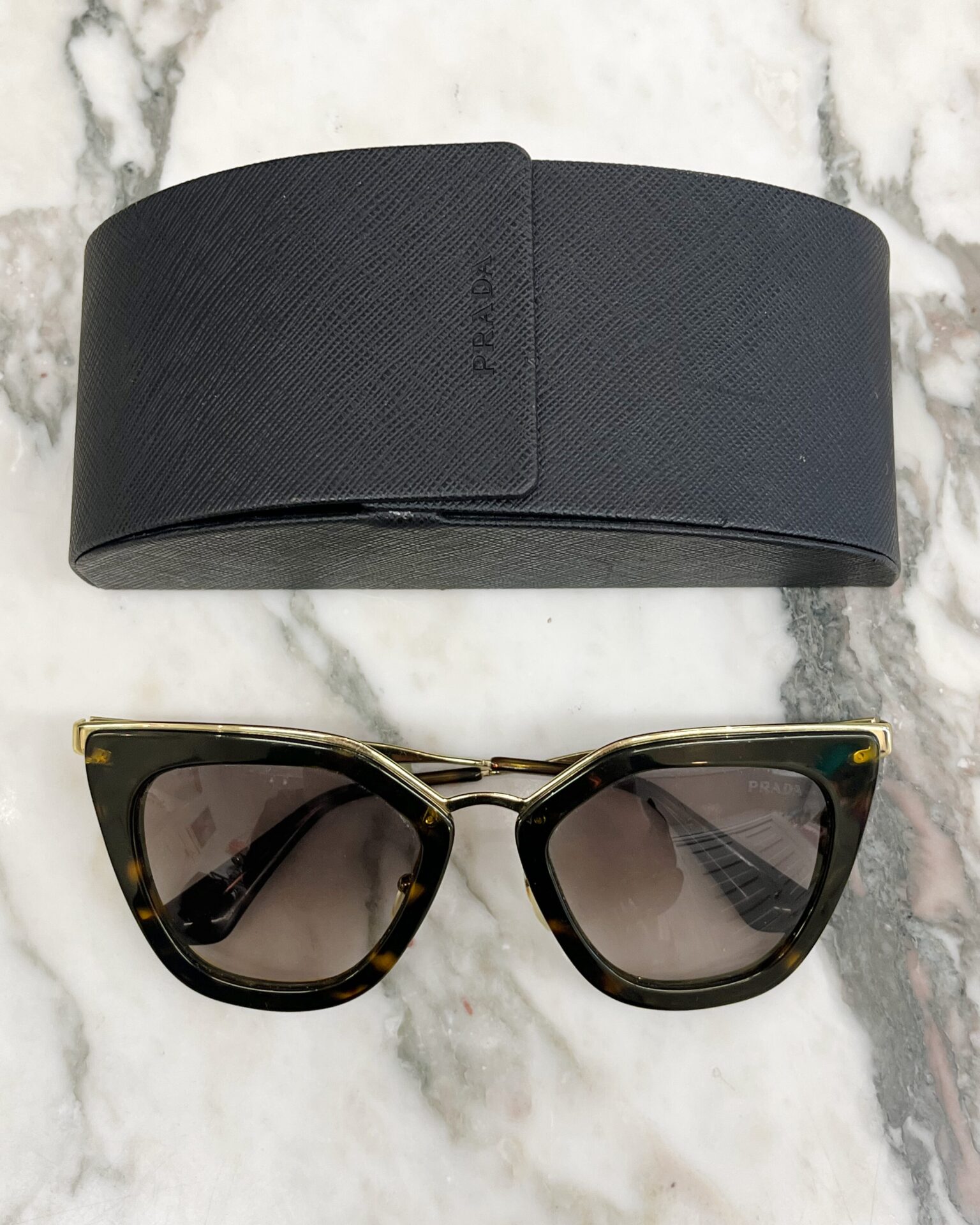 Prada SPR535 tortoiseshell cat eye sunglasses