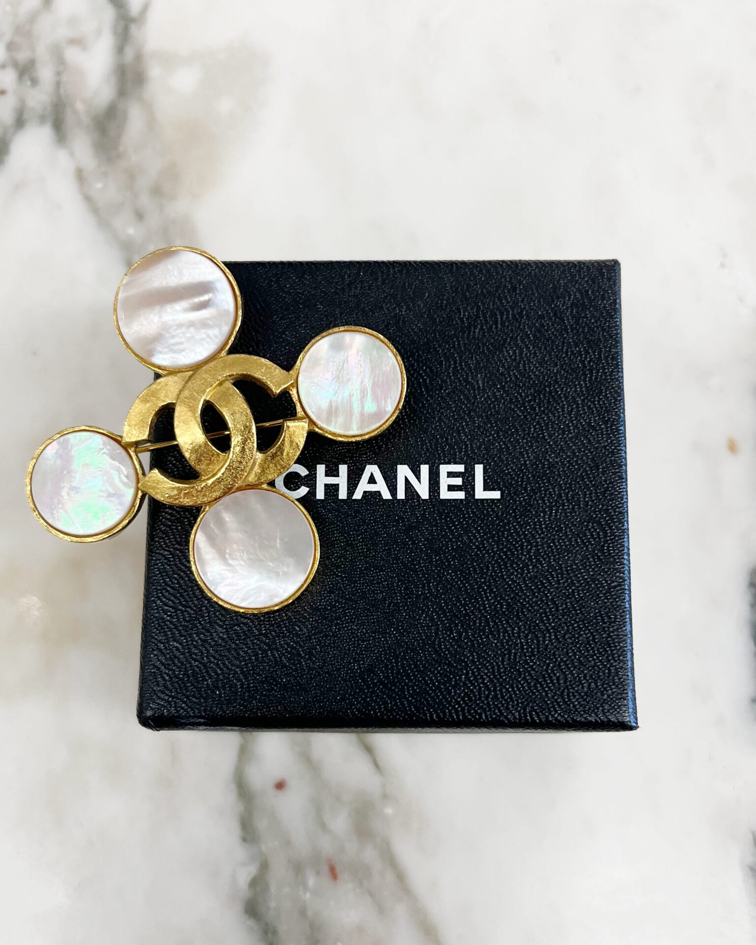 Chanel 1995 gold 'CC' brooch with mother of pearl circles