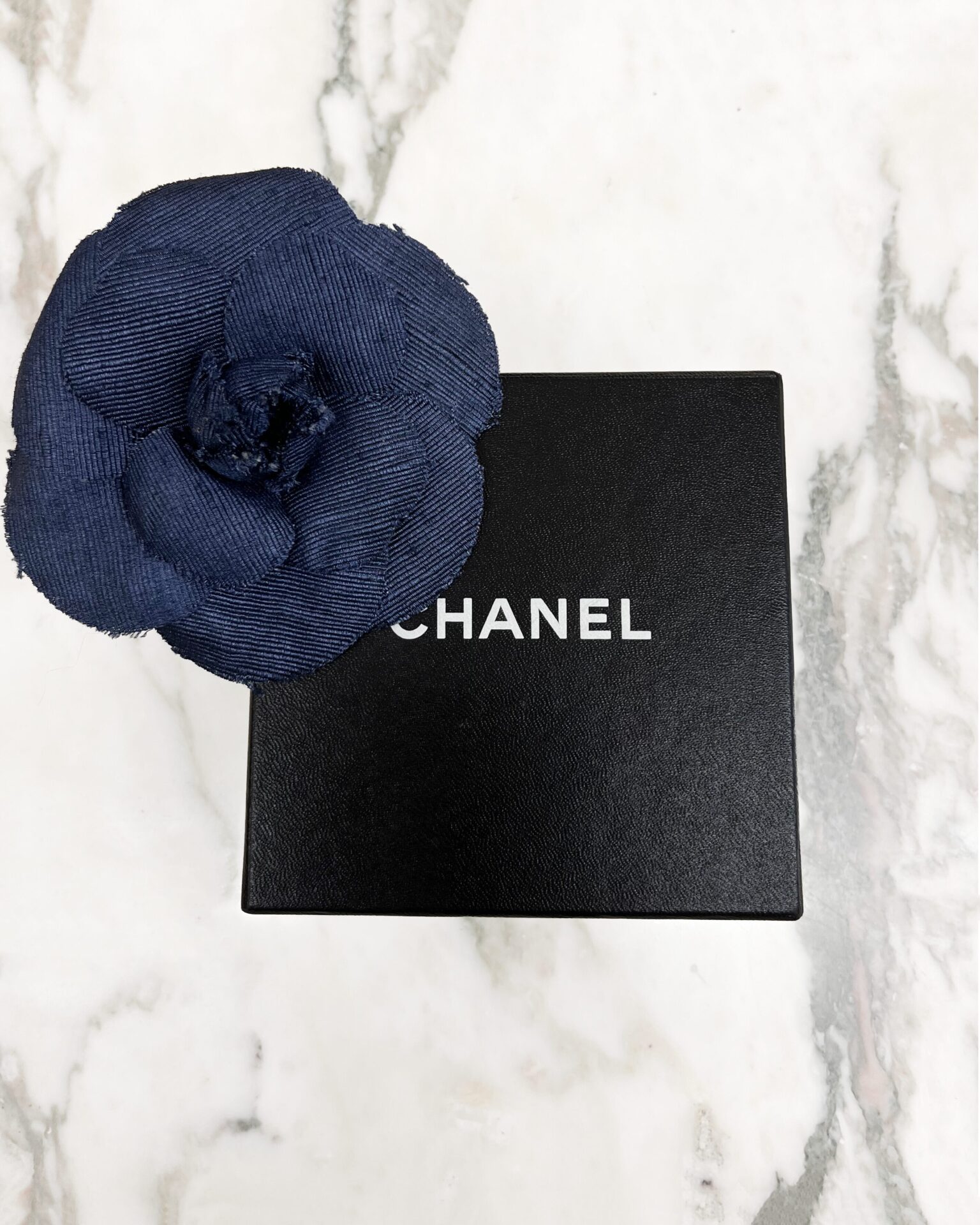 Chanel navy silk grosgrain Camellia brooch