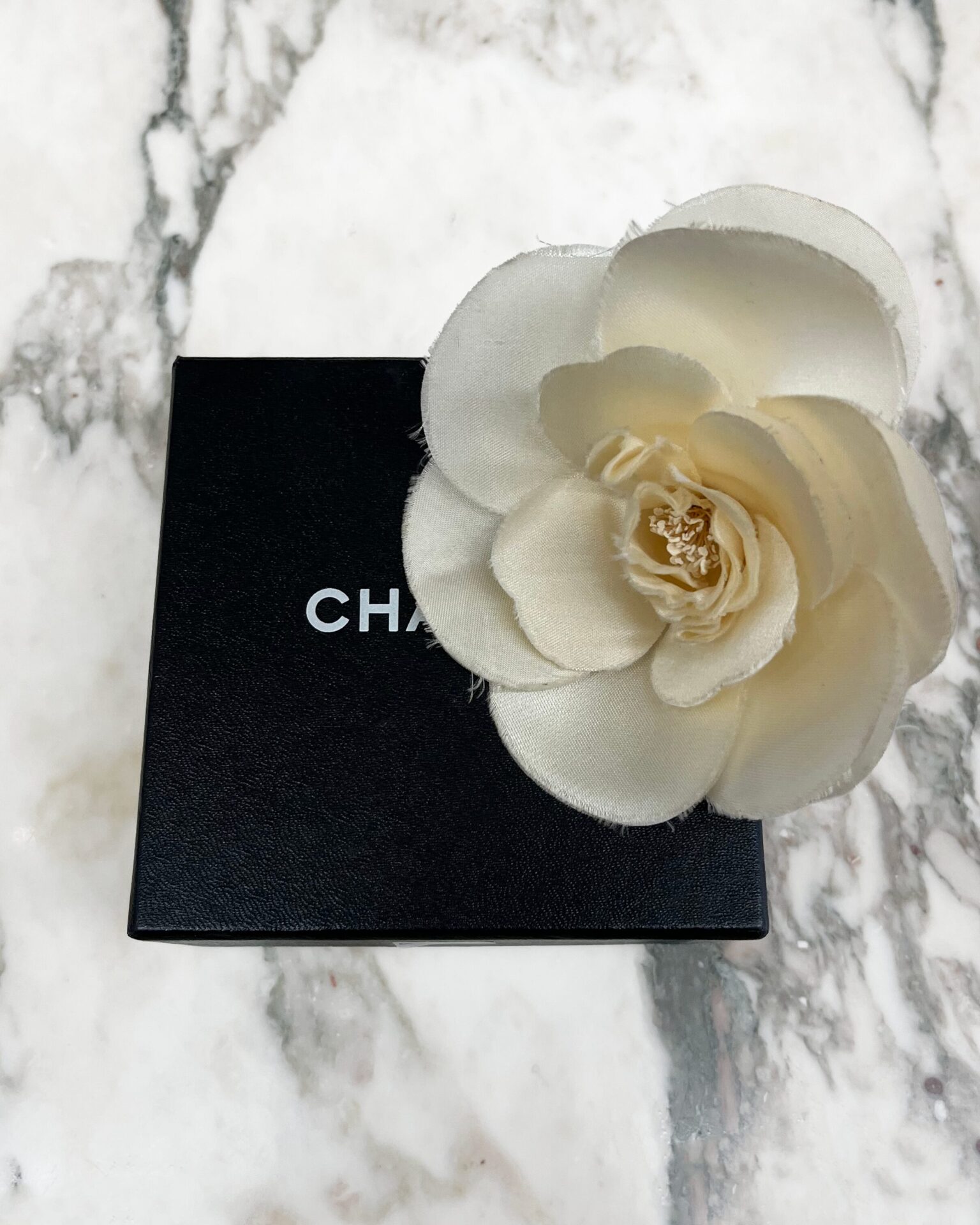 Chanel cream silk camellia brooch