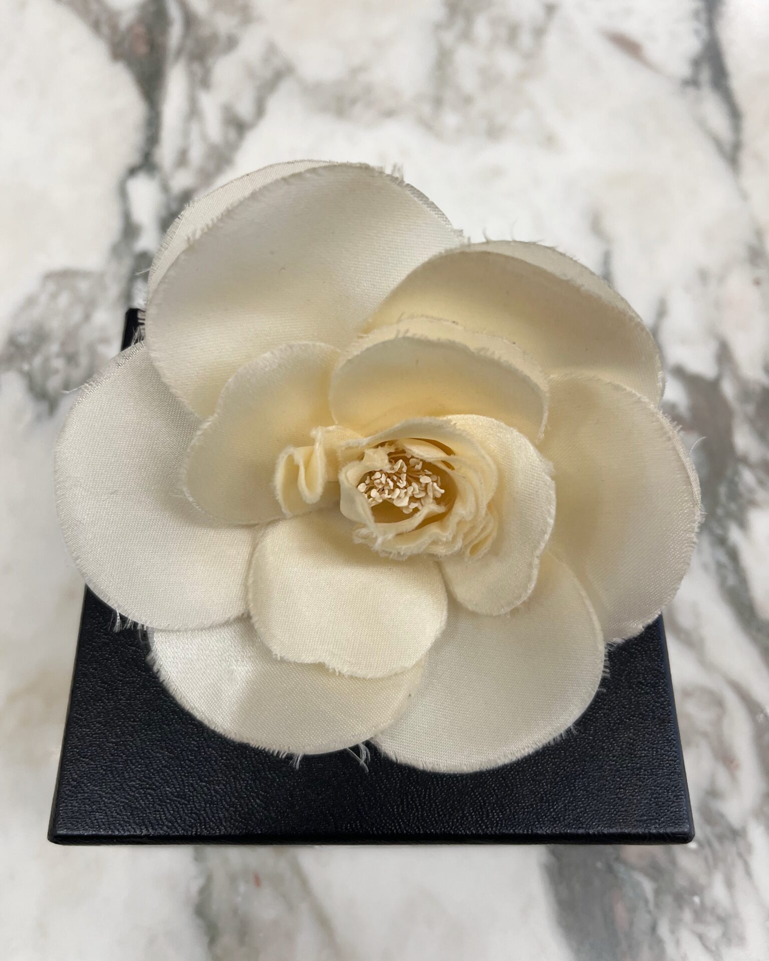 Chanel cream silk camellia brooch
