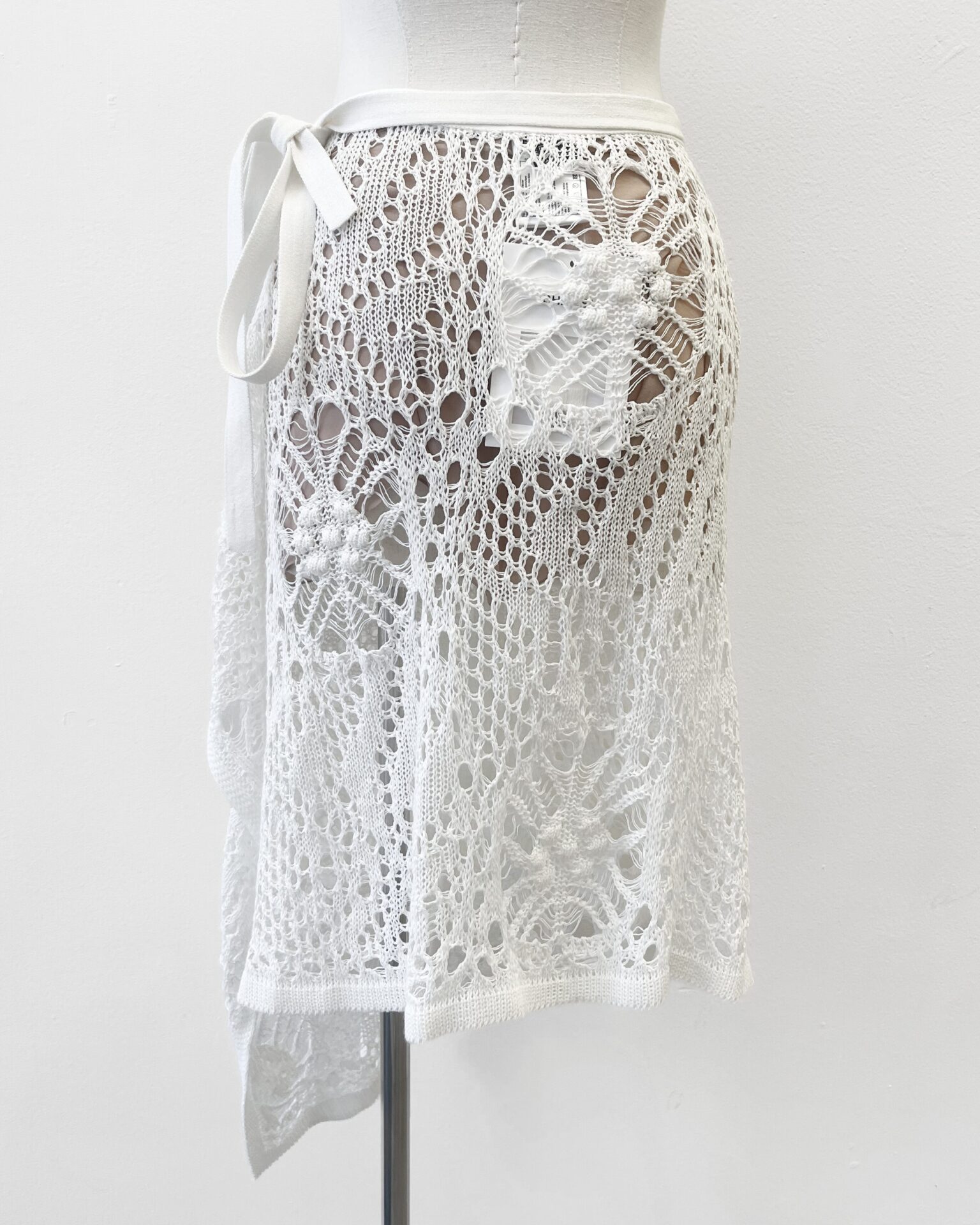 Chanel 2022C white crochet Pareo skirt with tan silk shorts