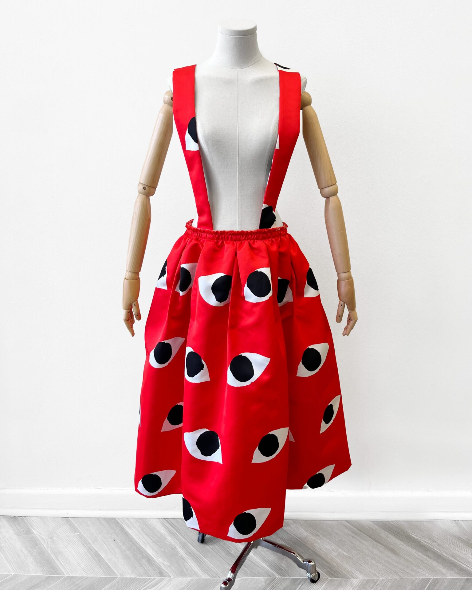 Comme Des Garcons SS2021 eye print suspender skirt