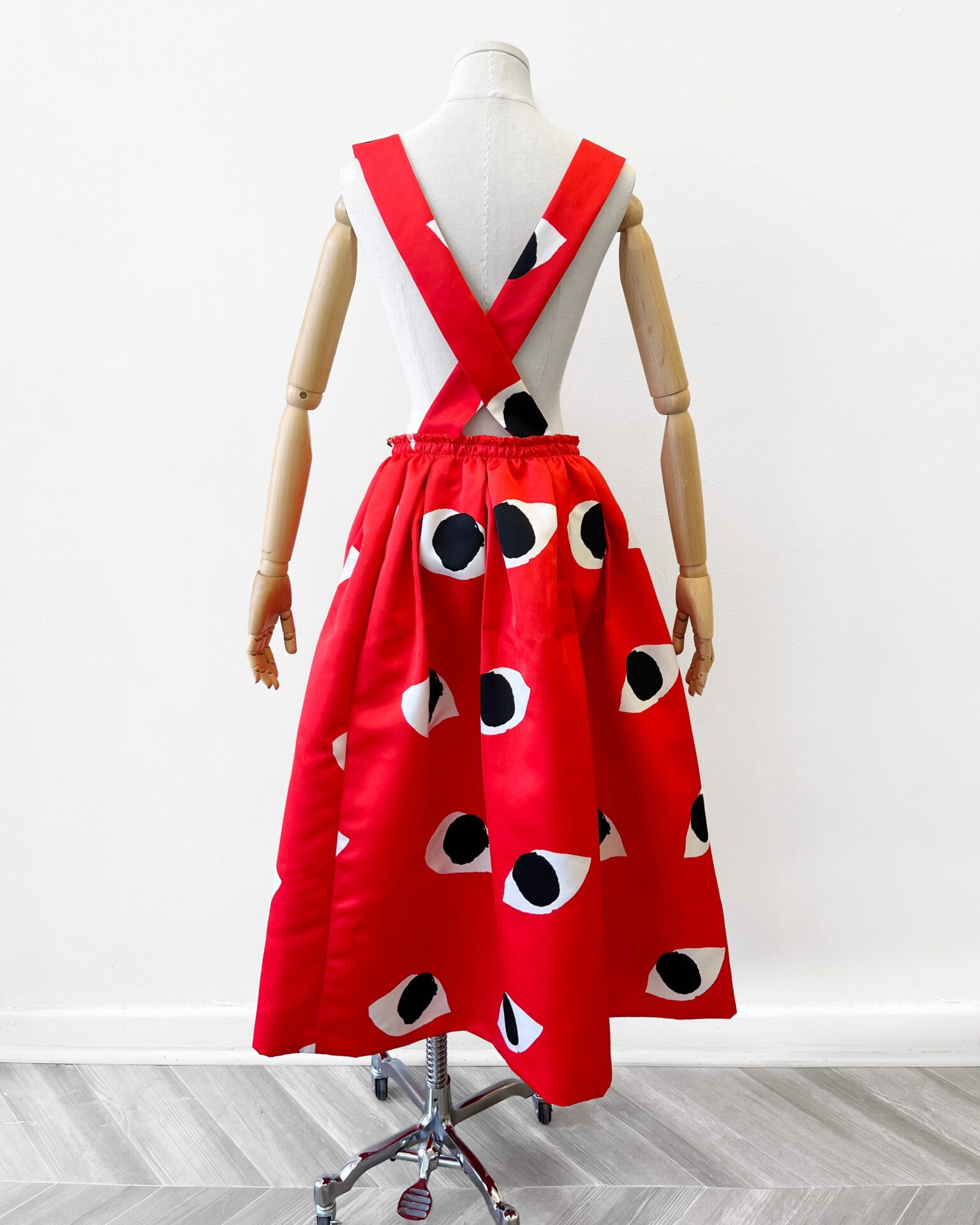 Comme Des Garcons SS2021 eye print suspender skirt