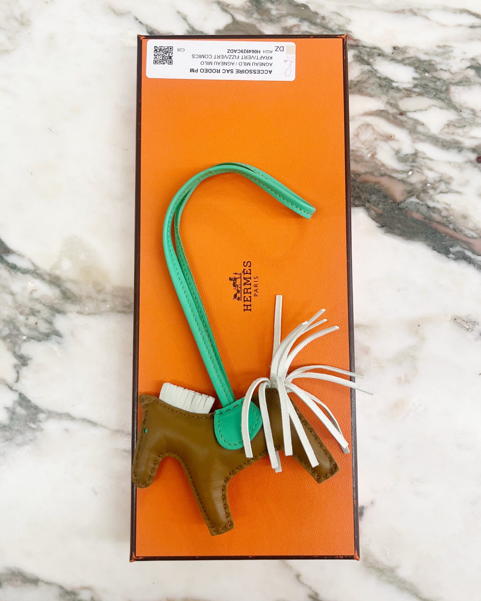 Hermes 2023 Rodeo PM charm in kraft/vert leather