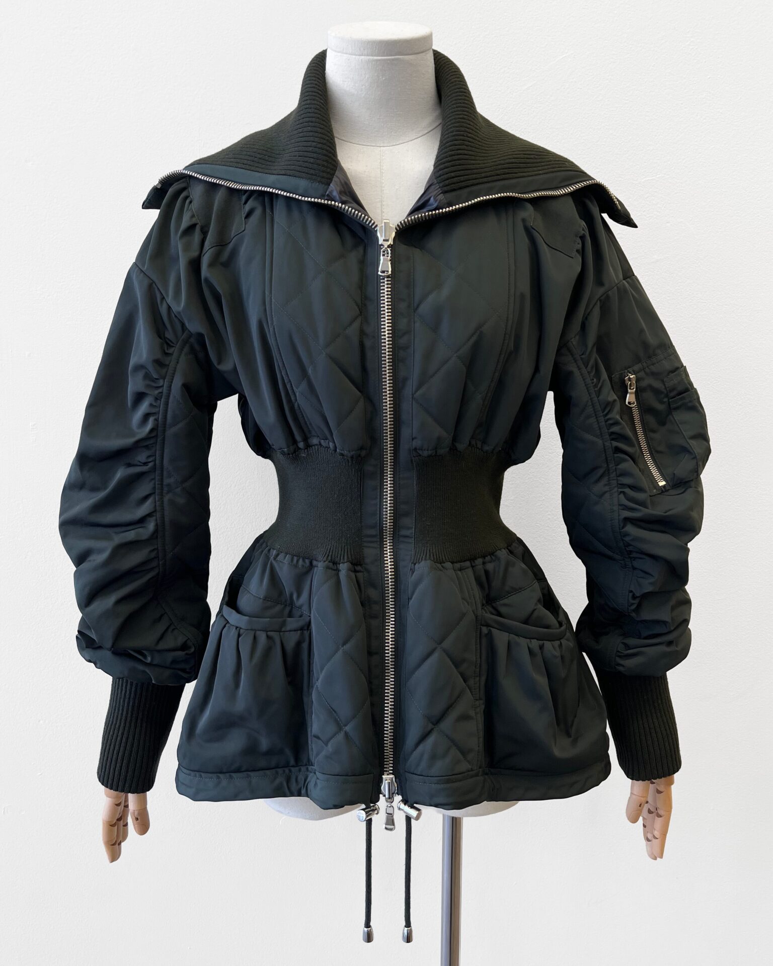 Alexander McQueen green peplum bomber jacket