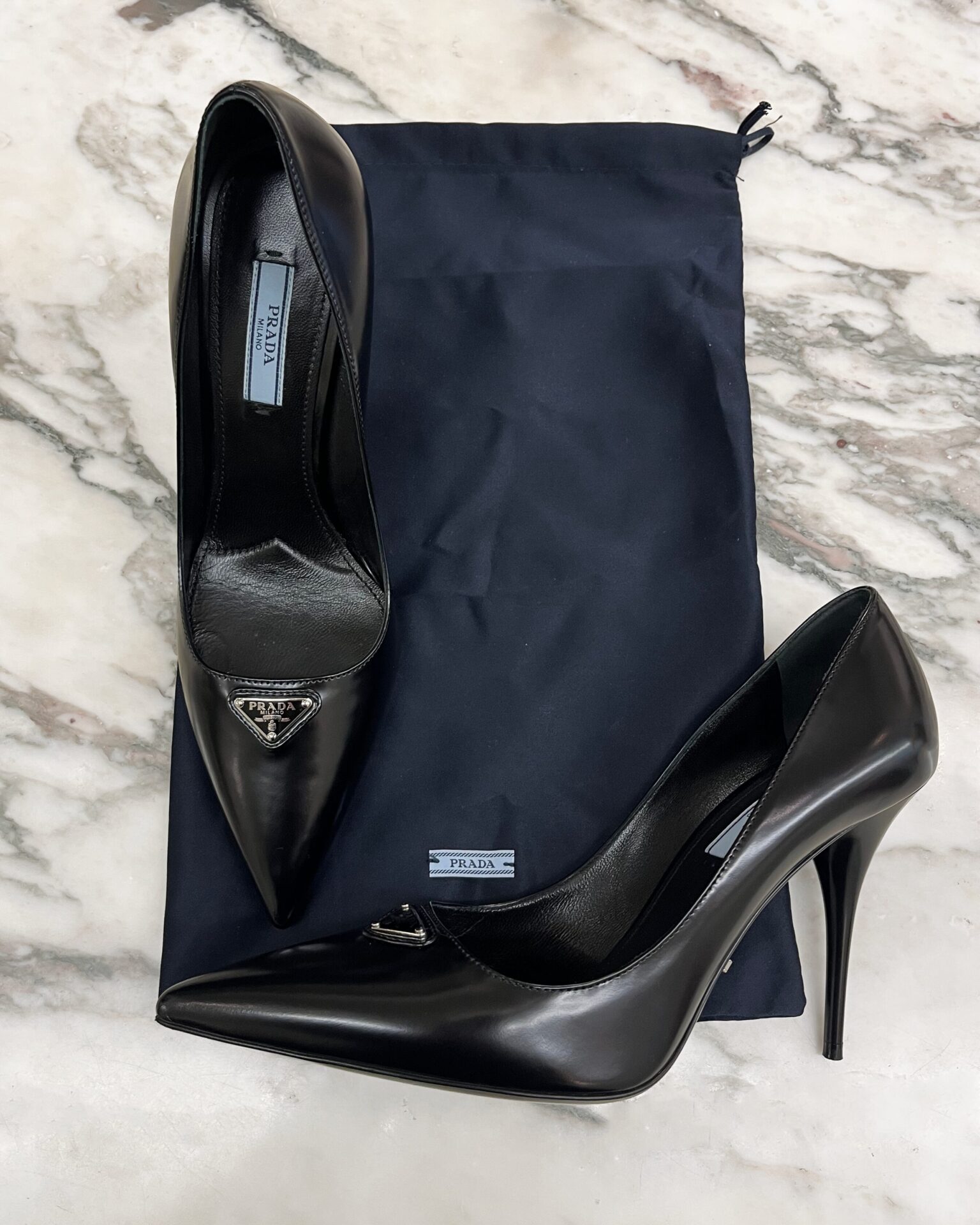 Prada brushed leather logo pumps in black