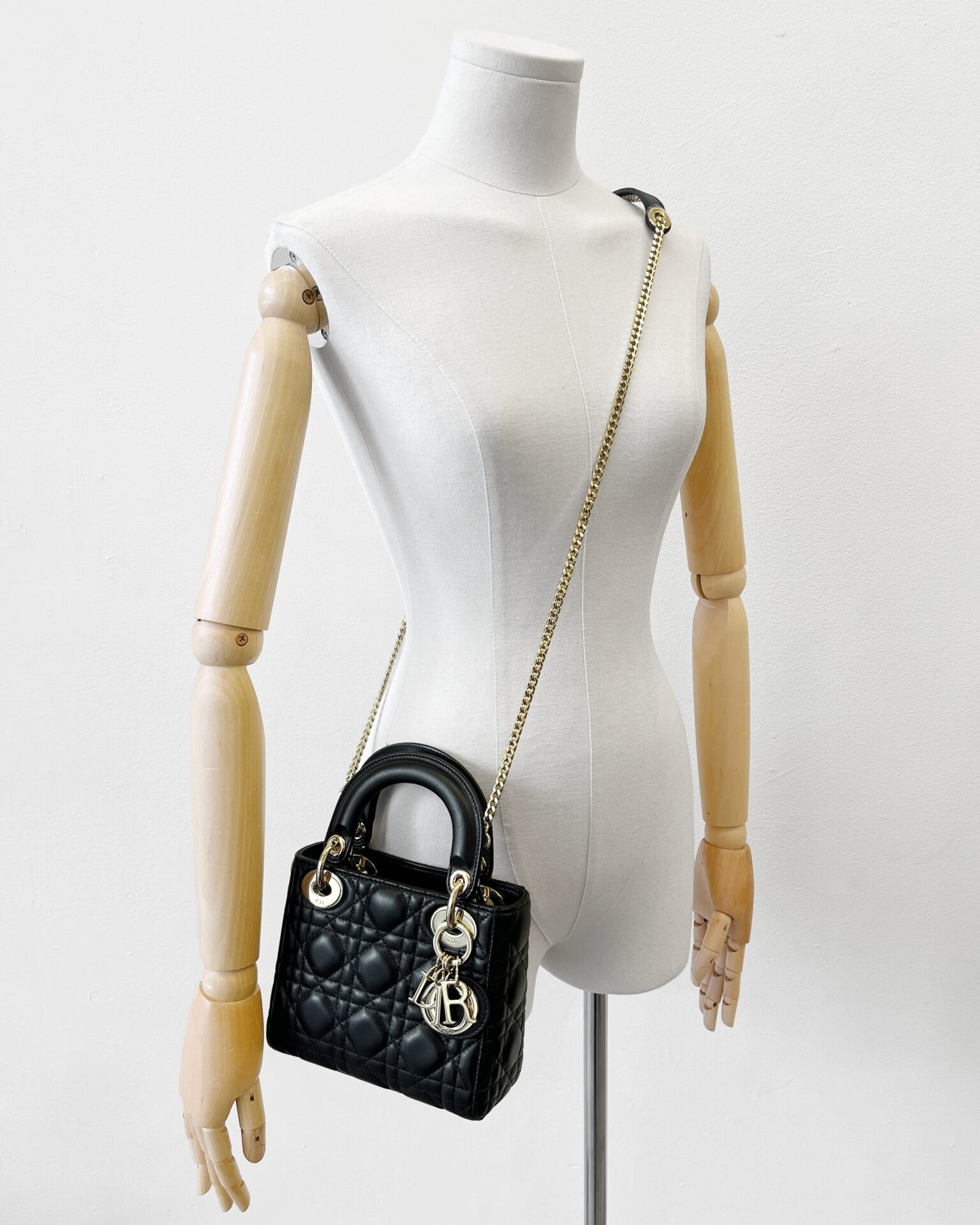 Dior mini Lady Dior bag in black Cannage lambskin with strap