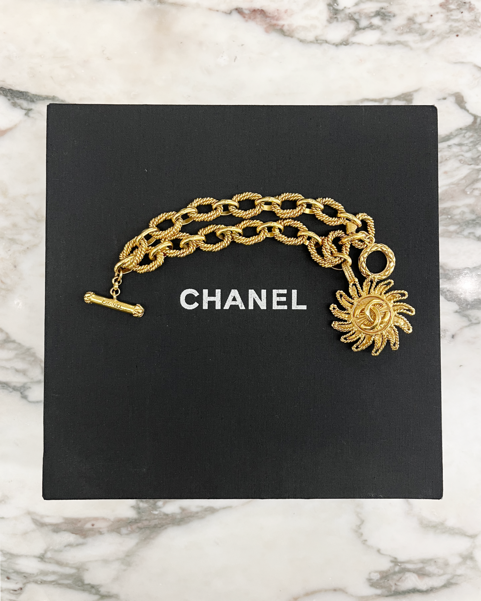 Chanel 1994 sun charm twist link bracelet
