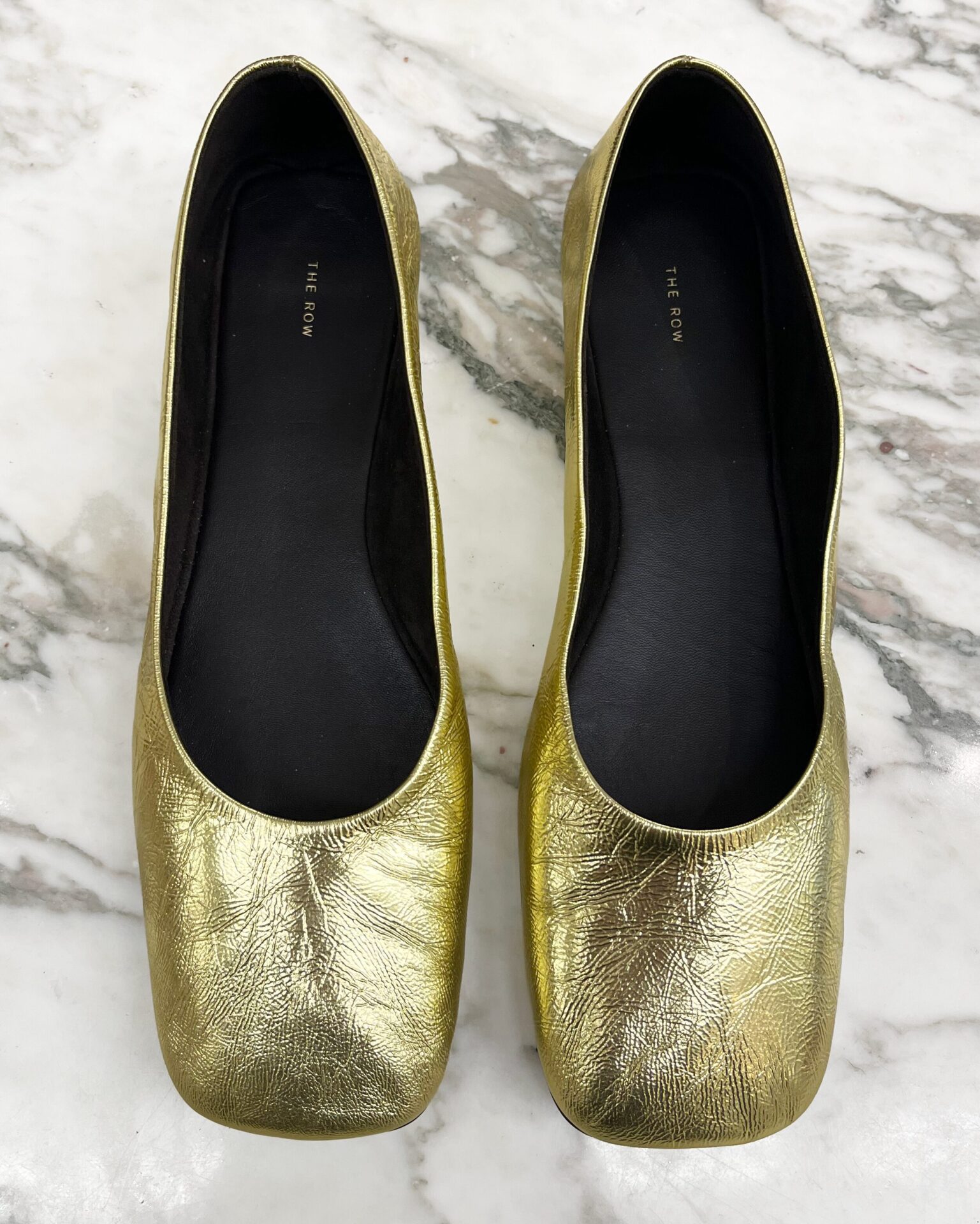 The Row square toe ballet flats in gold